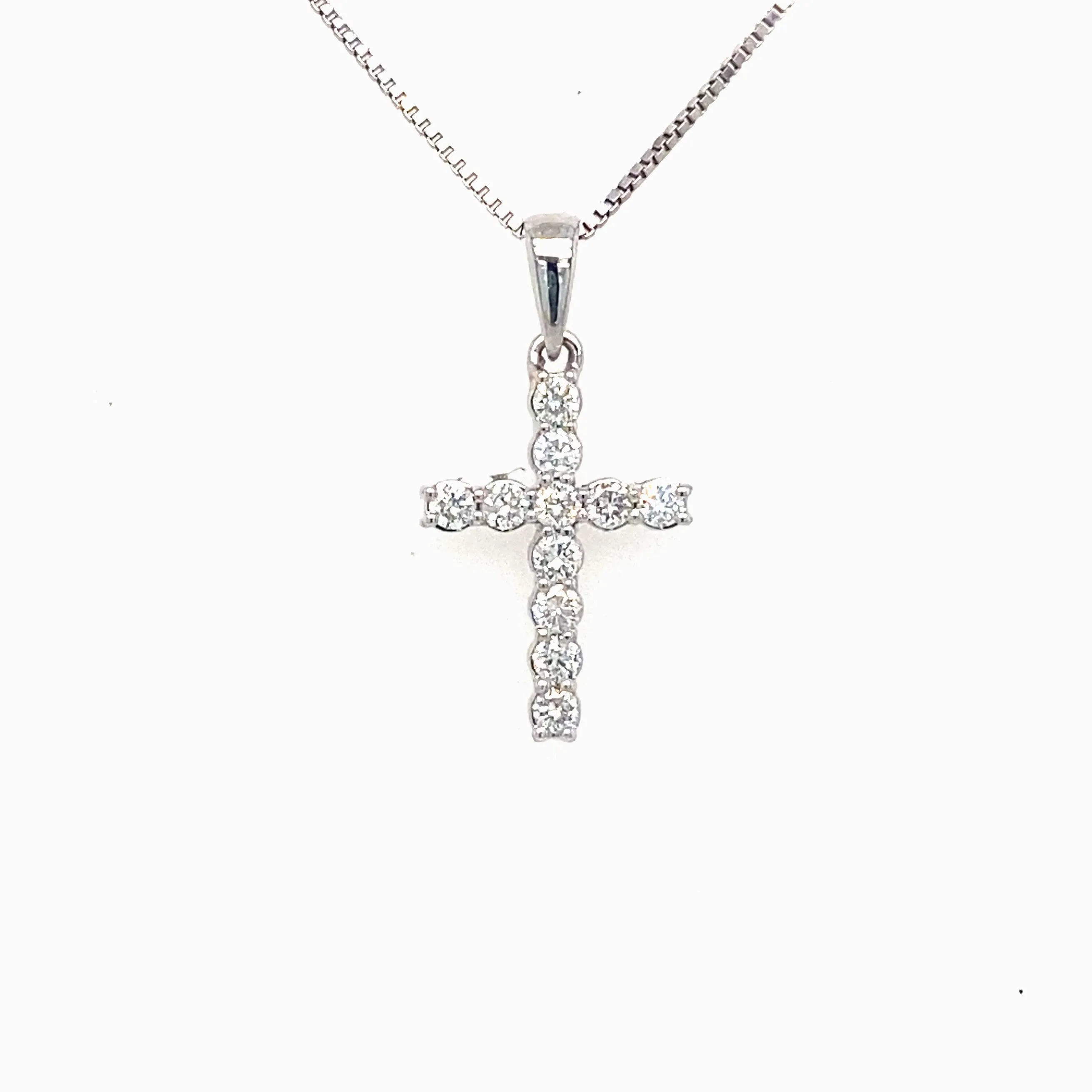 Eleven Round Diamond Cross Pendant